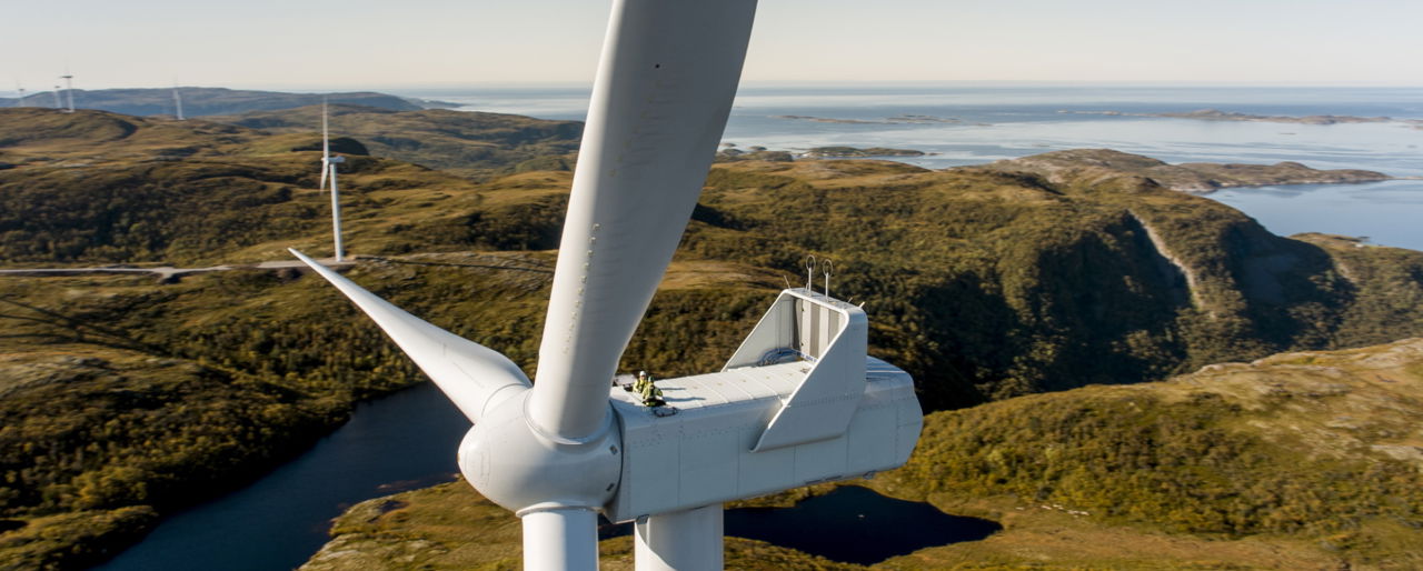 Top of a wind turbine near the ocean