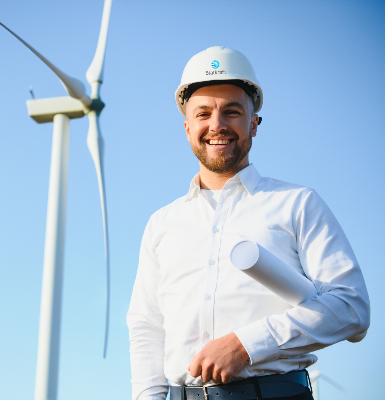 Engineer in front of wind turbine
