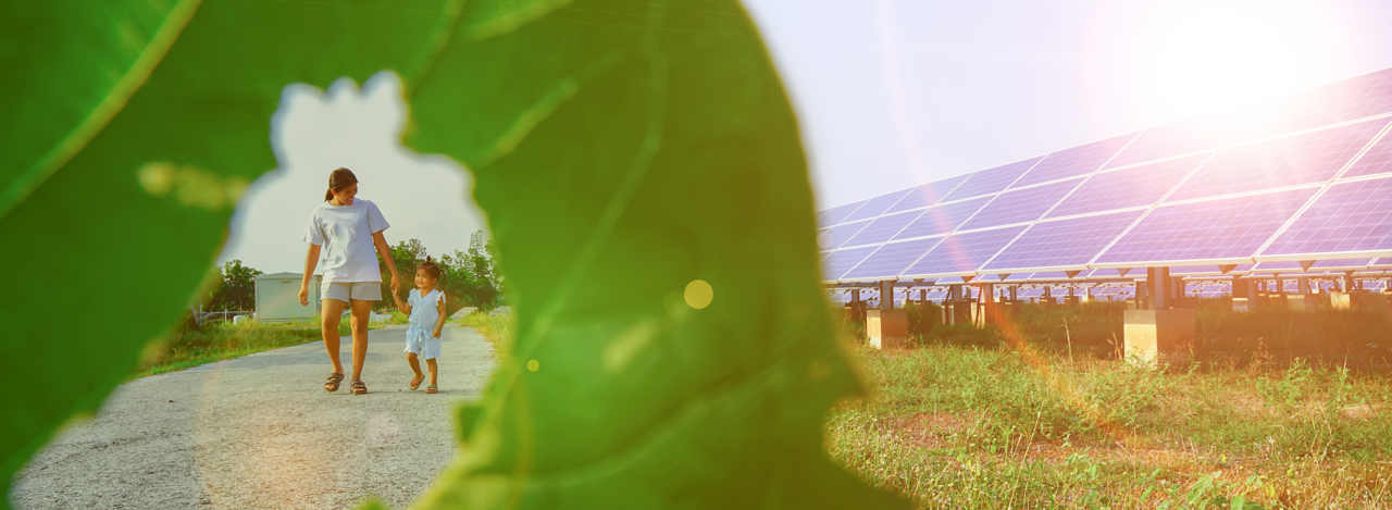 Mother and child at solar farm