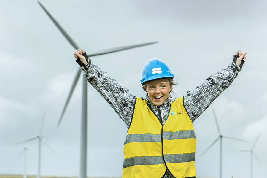 Young girl at wind farm
