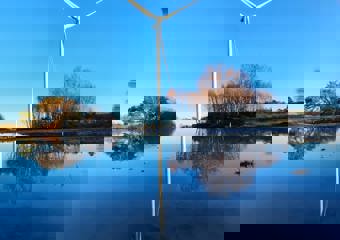 Wind Turbine reflected in water
