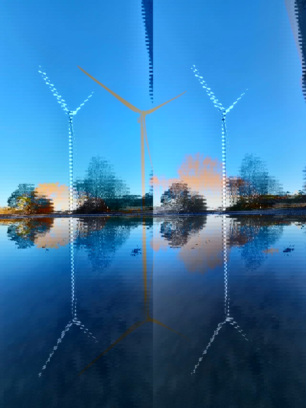 Wind Turbine reflected in water